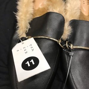 Black faux-leather mules